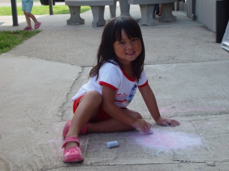 Kasen coloring with sidewalk chalk